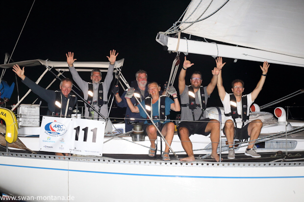 SY Montana at the finish line in St. Lucia at night